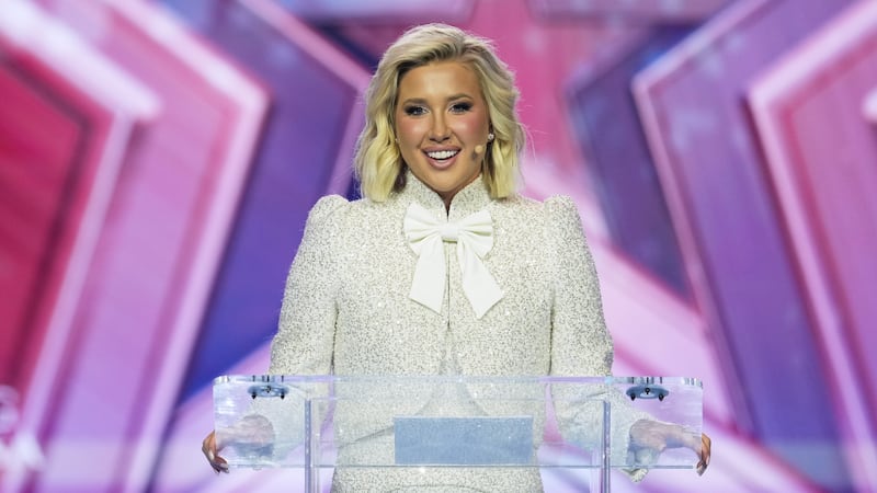 Savannah Chrisley speaks during Turning Point USA's AmericaFest 2025, Friday, Dec. 19, 2025,...