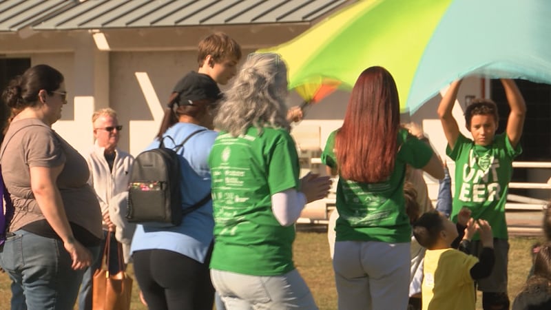 Families, volunteers and athletes gather at the Special Olympics