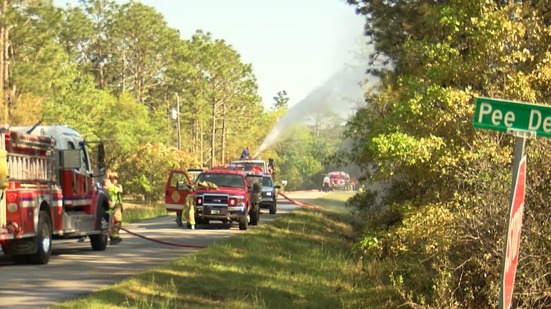 Fire Boared Spring Two-acre brush fire in Boiling Spring Lakes contained by crews
