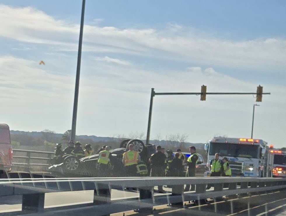 Car flips in two-vehicle crash on Cape Fear Memorial Bridge