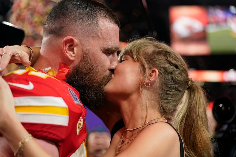 It’s a love story: Travis Kelce celebrates Super Bowl win with