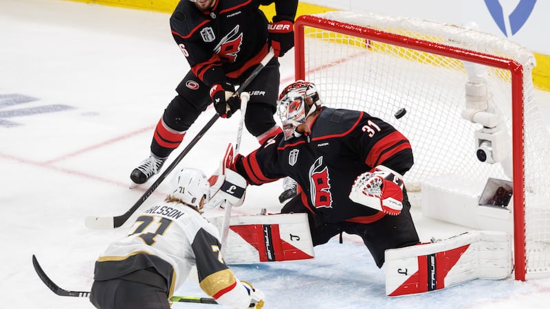 Vegas Golden Knights' William Karlsson (71) scores a goal past Carolina Hurricanes' Frederik...