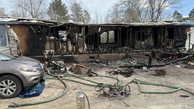 A photo of the aftermath of a house fire that killed two children provided by the State Bureau...